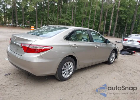 2015 Toyota Camry Le z USA, uszkodzony, nr VIN 4T4BF1FK5FR487267